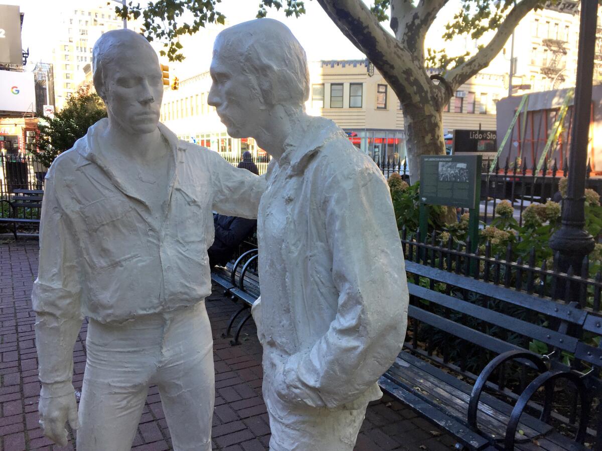 Two figures that are part of the Gay Liberation Monument in Christopher Park across from the Stonewall Inn in Greenwich Village in New York.