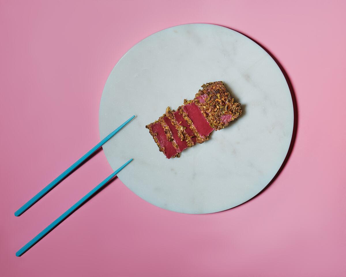 A plate with chopsticks and plant-based tuna