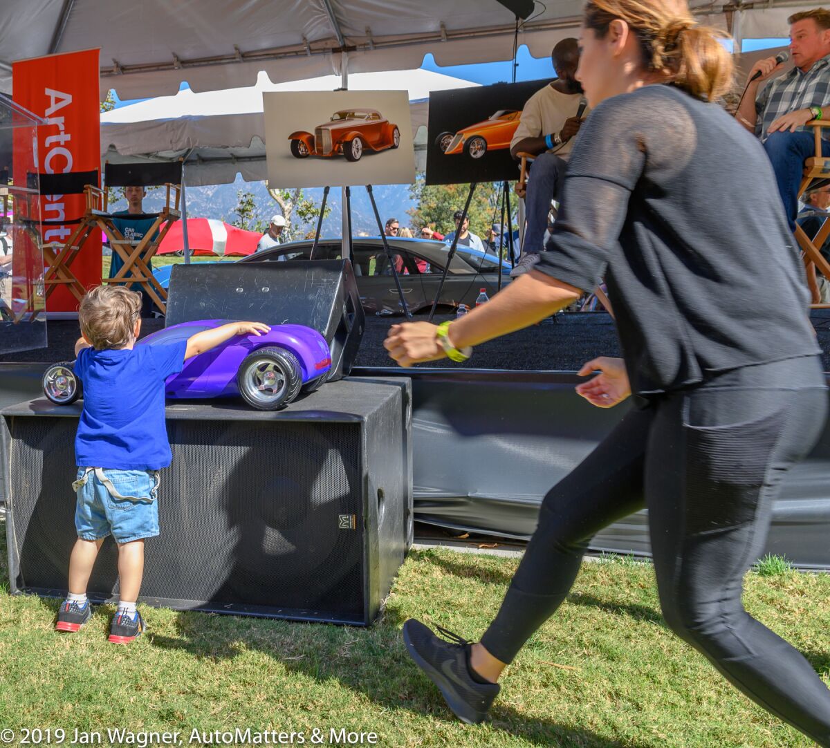 A future auto designer rushes the stage during Chip Foose’s Car Classic 2019 interview