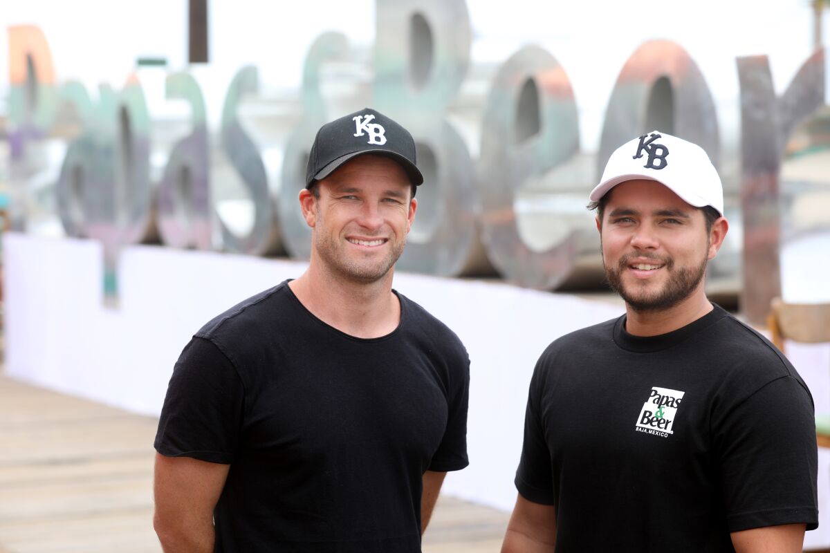 Chris Den Uijl, left, and Aaron Ampudia, co-founders of Baja Beach Fest 2019, at Papas & Beer on Aug. 7 in Rosarito, Mexico.