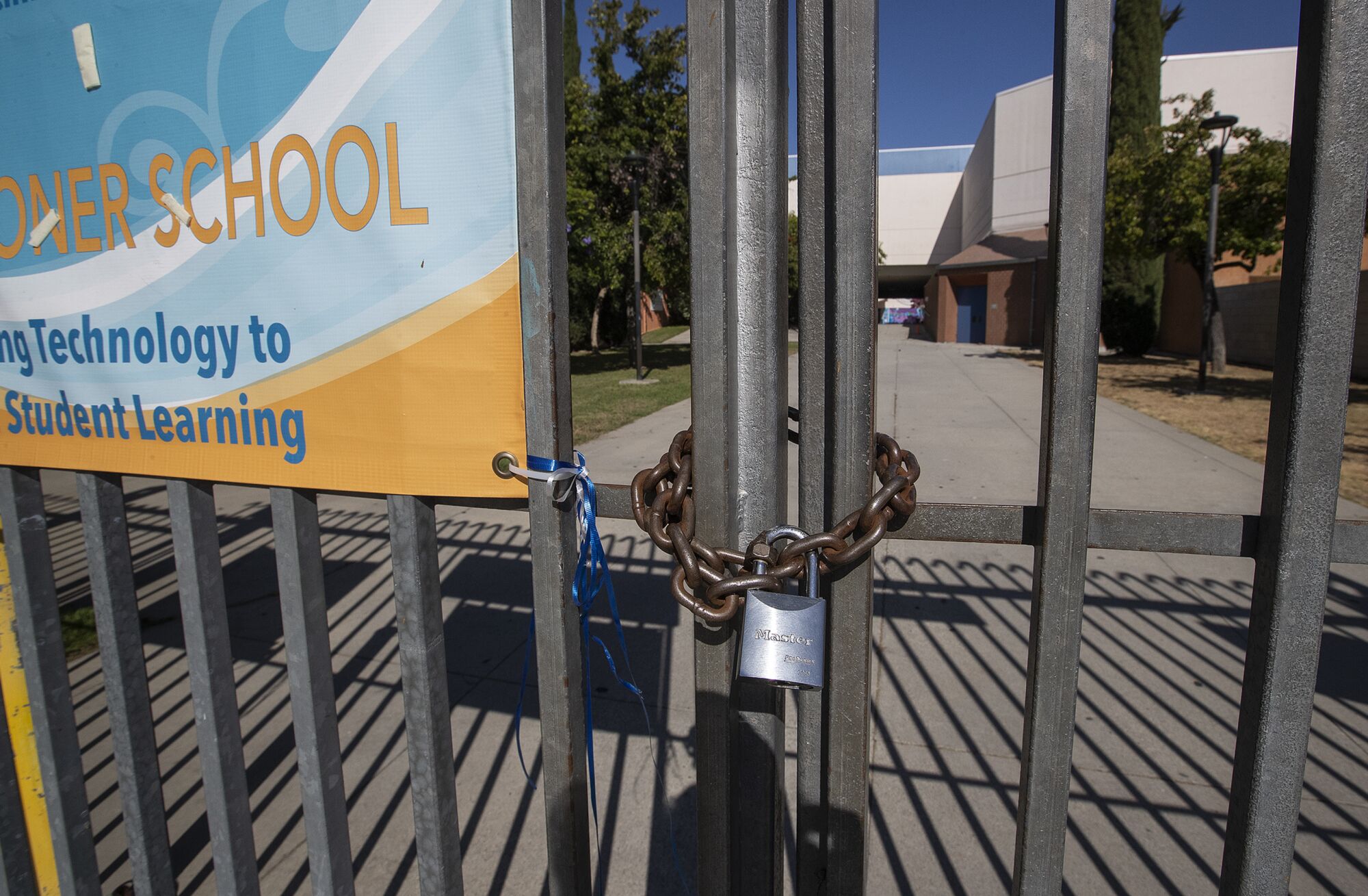 A gate at Los Angeles High School remains locked.