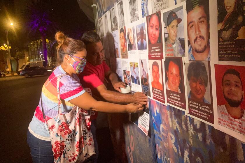 Family members of Mexico's disappeared tried to rename the Glorieta de la Palma roundabout in Mexico City in honor of the missing.