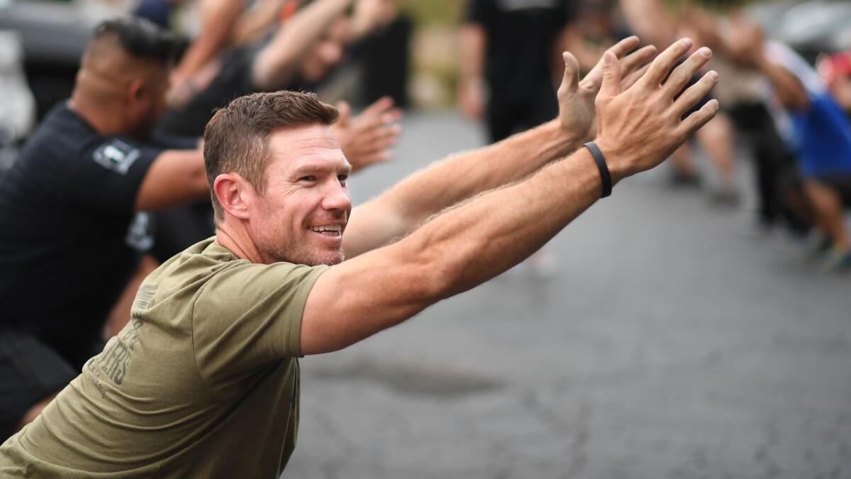 Military veteran Nate Boyer, working out at the Unbreakable Performance Center in West Hollywood, says he was initially disappointed when he learned Colin Kaepernick sat through the national anthem in 2016.