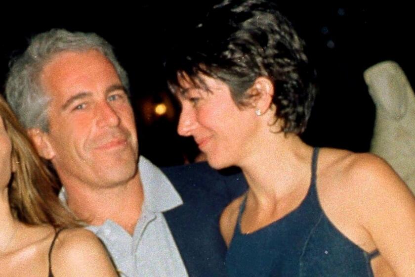 Financier (and future convicted sex offender) Jeffrey Epstein, and British socialite Ghislaine Maxwell pose together at the Mar-a-Lago club, Palm Beach, Florida, February 12, 2000. (Photo by Davidoff Studios/Getty Images)