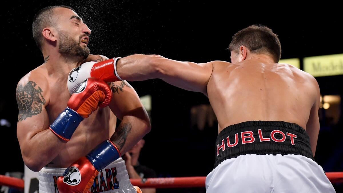 Vanes Martirosyan takes a punch from Gennady Golovkin losing in a second round knockout.