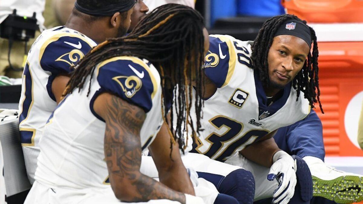 Rams running back Todd Gurley sits on the bench in the fourth quarter of the NFC championship game.