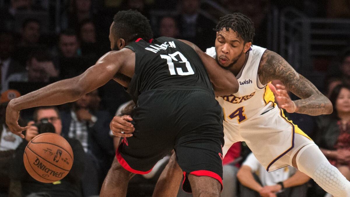 Lakers forward Brandon Ingram fouls Houston guard James Harden on Dec. 3 at Staples Center.