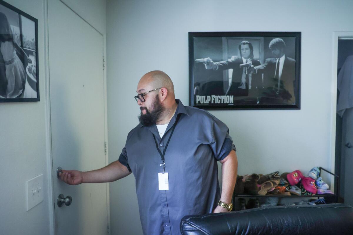 Bradley Rosales Garcia prepares to leave his apartment at Sienna Residences on Aug. 14.