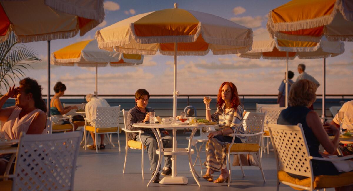 Armen Nahapetian and Zoe Lister-Jones in the movie "Beau Is Afraid."