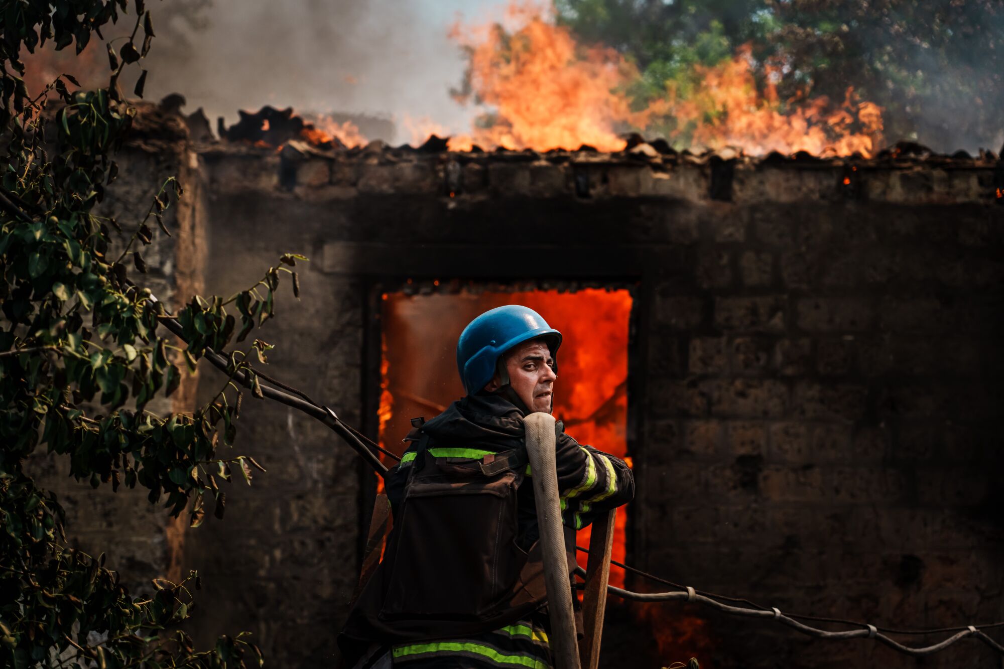 House on fire after bombardment