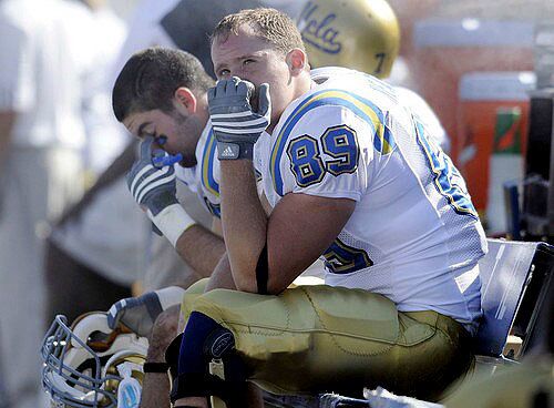 Adam Heater stares at the scoreboard near the end of UCLA's 59-0 loss to Brigham Young on Saturday.