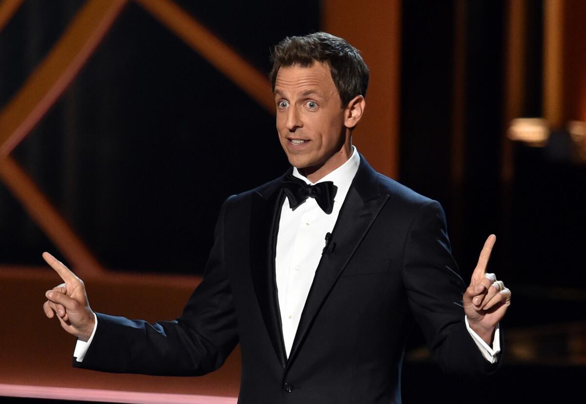 Seth Meyers speaks to the audience at the Emmy Awards ceremony at the Nokia Theatre on Aug. 25.