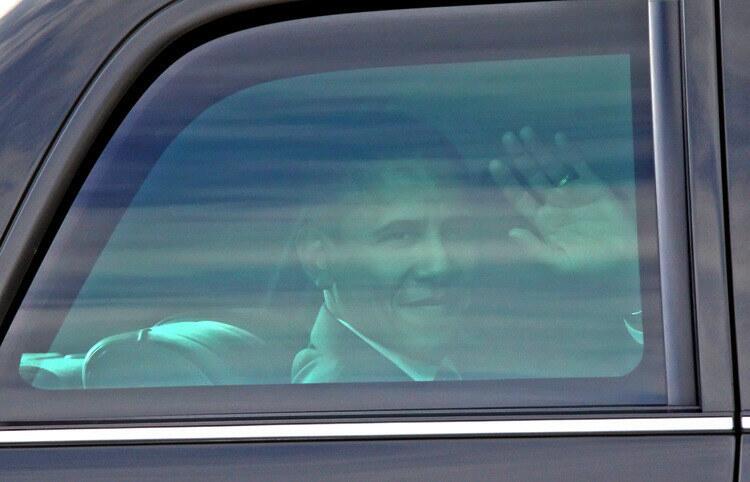 President Barack Obama waves from his limo after taping a radio show at 655 N. Central Ave. in Glendale on Friday, October 22, 2010. The president taped a radio show with El Piolin at this location.