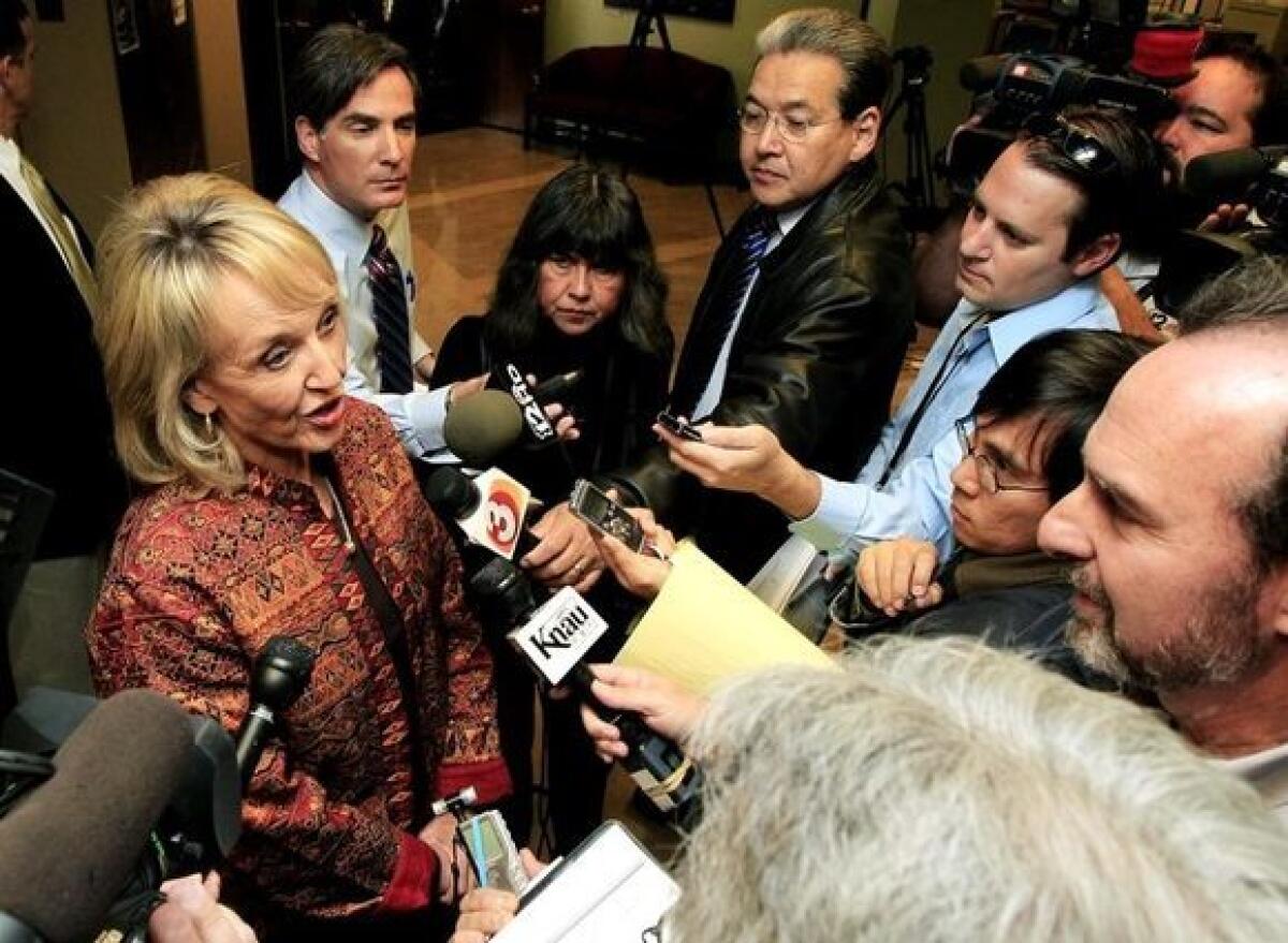 Gov. Jan Brewer answers questions at the Arizona Capitol on Nov. 21 in Phoenix.