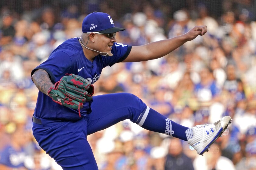 Dodgers starting pitcher Julio Urías delivers during the sixth inning of a 4-2 win over the Giants on July 23, 2022.