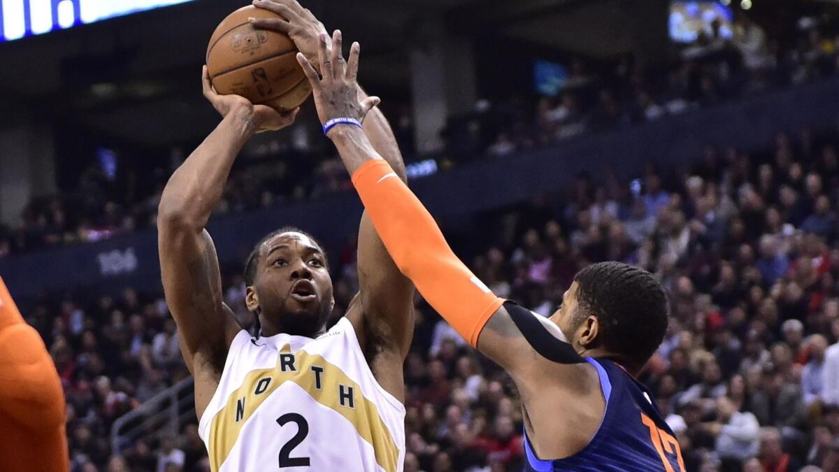 Forward Kawhi Leonard, shooting over Thunder forward Paul George, will try to lead the Raptors back to the Eastern Conference finals.