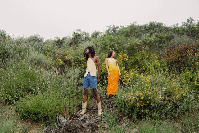 LOS ANGELES , CA - MAY 19: Models Deshion and Hannah in the new collection from Loewe at Franklin Canyon Reservoir on Friday, May 19, 2023 in Los Angeles , CA. (Mariah Tauger / Los Angeles Times)