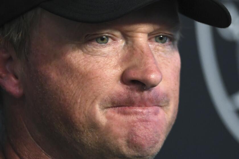 FILE - Las Vegas Raiders head coach Jon Gruden speaks to the media after an NFL football practice in Henderson, Nev., Saturday, July 31, 2021, file photo. Former Raiders coach Jon Gruden says he is “ashamed” about his old offensive emails that cost him his job and hopes to get another chance in football. Gruden spoke publicly Tuesday, Aug. 30 about the affair at the Little Rock Touchdown Club for the first time since he resigned as coach of the Raiders last October. (AP Photo/David Becker, File)