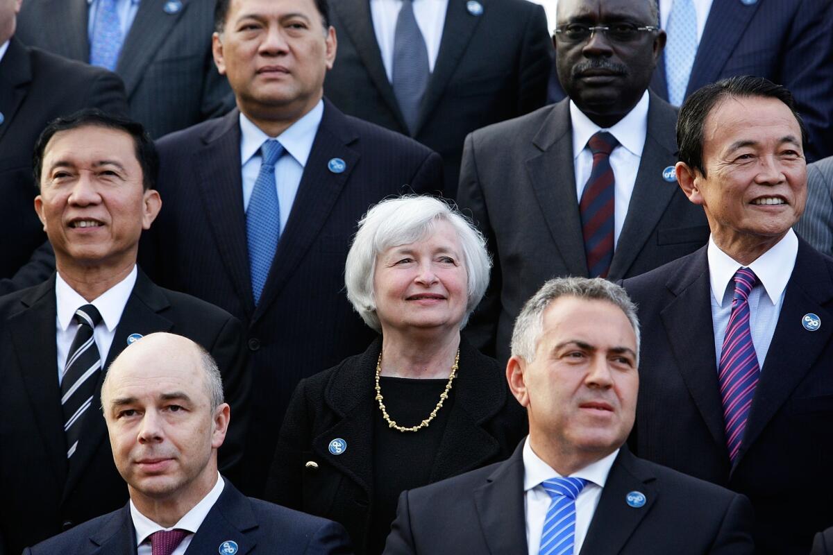 Federal Reserve Chairwoman Janet L. Yellen, center, poses during the official group photo at the G20 Finance Ministers and Central Bank Governors meeting in Sydney, Australia.