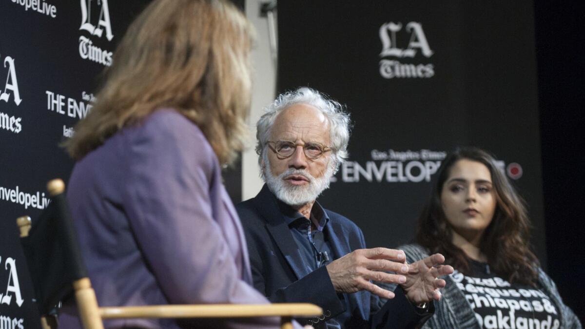 "Eldorado" director Markus Imhoof, center, with Los Angles Times critic Lorraine Ali, left, and Muna Sharif of Amnesty International, right, at the LA Times Envelope Live screening at the Montalban.