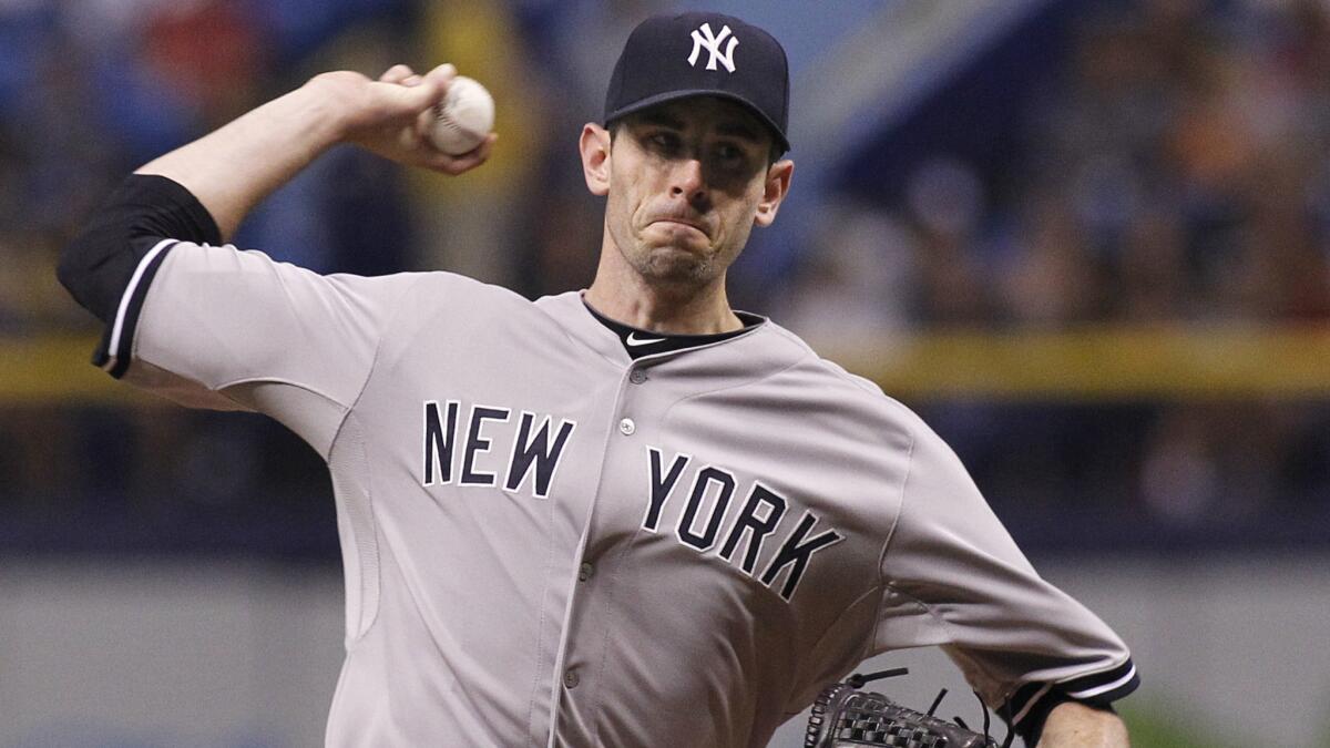 Brandon McCarthy, pitching for the New York Yankees, delivers during a game against the Tampa Bay Rays in September.