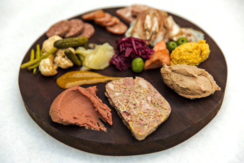 The soul of Terrine's menu is its assiette de charcuteries, shown here with servings of truffled chicken liver, terrine de campaign, liverwurst, andouille and smoked beef deckle.