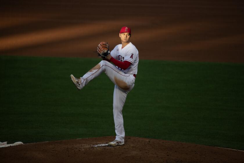 Anaheim, CA - June 21: Angels starting pitcher Shohei Ohtani delivers a pitch in the fourth nning against the Dodgers at Angel Stadium in Anaheim Wednesday, June 21, 2023. (Allen J. Schaben / Los Angeles Times)