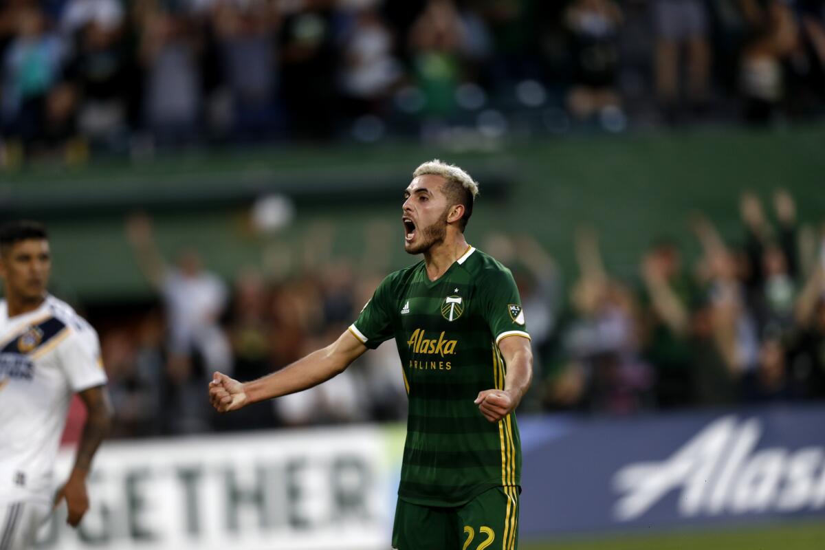 Portland Timbers' Cristhian Paredes (22) reacts during the first half of an MLS soccer match against the LA Galaxy in Portland, Ore., on Saturday, July 27, 2019. (Noble Guyon/The Oregonian via AP)