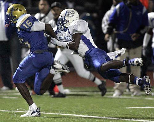 Crenshaw's DeAnthony Thomas goes for a long run in the third quarter and is finally brought down by Los Angeles Jordan's Deshawn Beck.