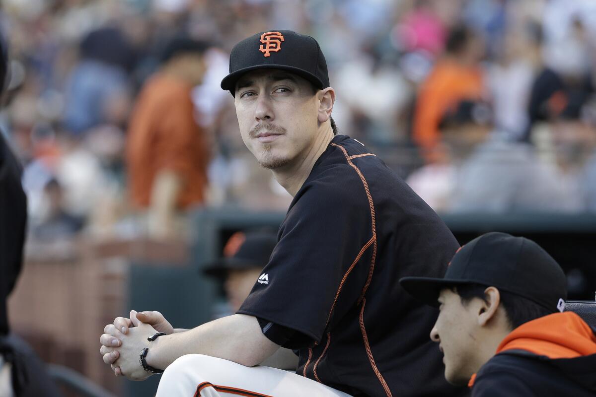Giants pitcher Tim Lincecum looks on during a baseball game against the Brewers on July 28, 2015.