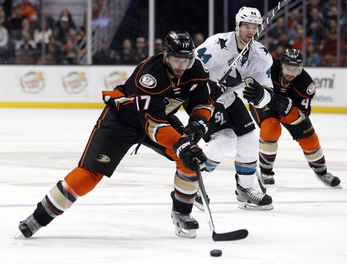 Ducks forward Ryan Kesler takes the puck up ice on a breakaway against Sharks defenseman Marc-Edouard Vlasic during the second period of a game on Feb. 2.