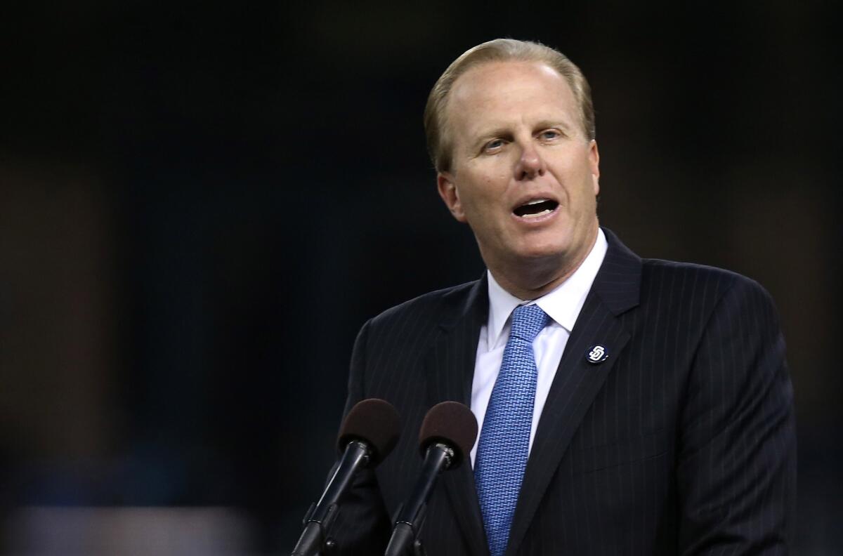 San Diego Mayor Kevin Faulconer speaks at two microphones.