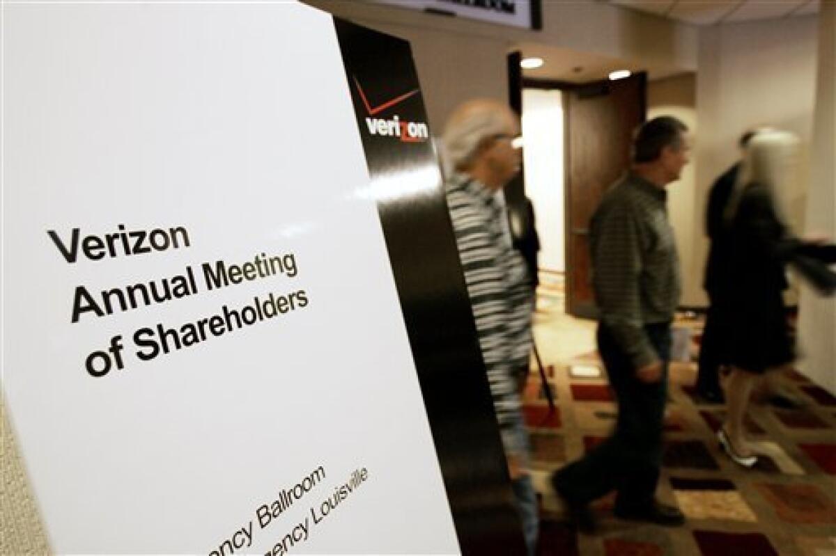 Shareholders leave the Verizon Communications Inc., annual meeting in Louisville, Ky., Thursday, May 7, 2009. Shareholders overwhelmingly endorsed the pay package for its top executives.(AP Photo/Ed Reinke)