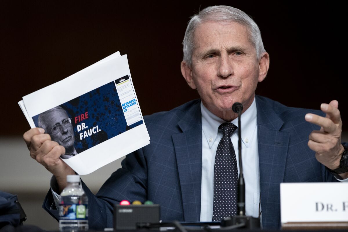 Dr. Anthony Fauci, director of the National Institute of Allergy and Infectious Diseases and chief medical adviser to the president, testifies before a Senate Health, Education, Labor, and Pensions Committee hearing to examine the federal response to COVID-19 and new emerging variants, Tuesday, Jan. 11, 2022 on Capitol Hill in Washington. (Greg Nash/Pool via AP)