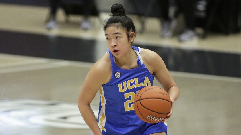 UCLA guard Natalie Chou controls the ball during a game against Washington State on Feb. 5.