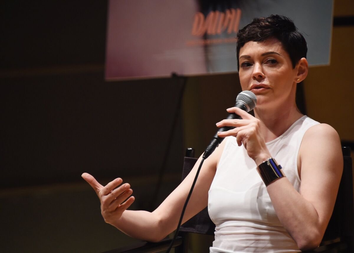 Rose McGowan answers questions about her directorial debut "Dawn" at a screening of the short film in New York on June 24.