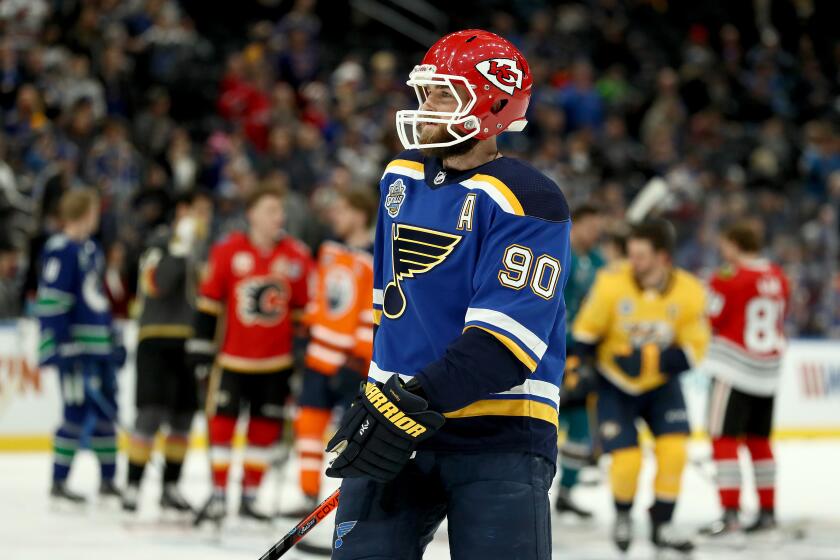 ST LOUIS, MISSOURI - JANUARY 24: Ryan O'Reilly #90 of the St. Louis Blues looks on in a Kanas City Chiefs helmet prior to the 2020 NHL All-Star Skills Competition at Enterprise Center on January 24, 2020 in St Louis, Missouri. (Photo by Jamie Squire/Getty Images)