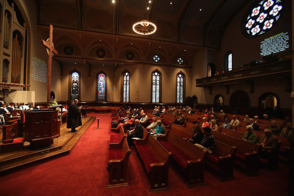 Rev. Rusty Cowden leads a Sunday service at the First Presbyterian Church in Warren, Ohio.