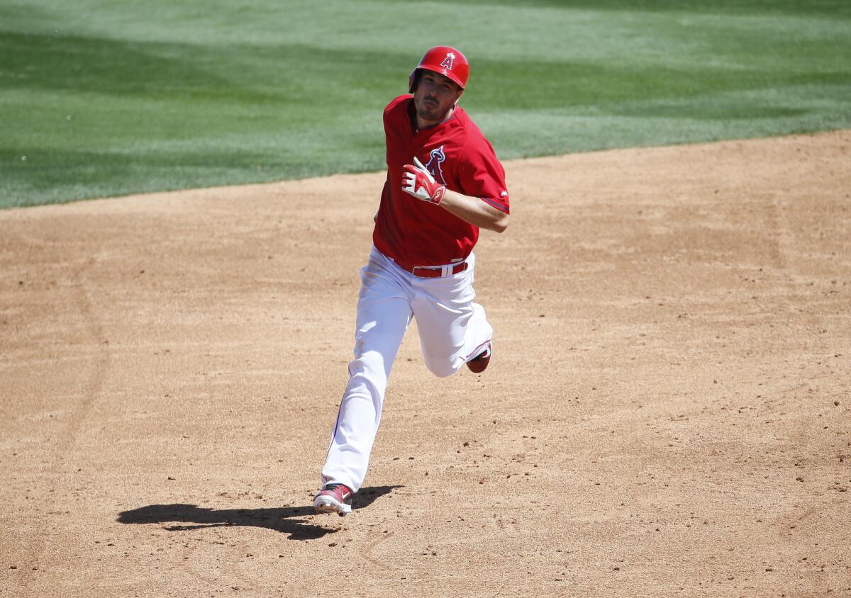 Angels outfielder Matt Joyce rounds the bases after hitting a home run in Wednesday's 4-3 spring training win.
