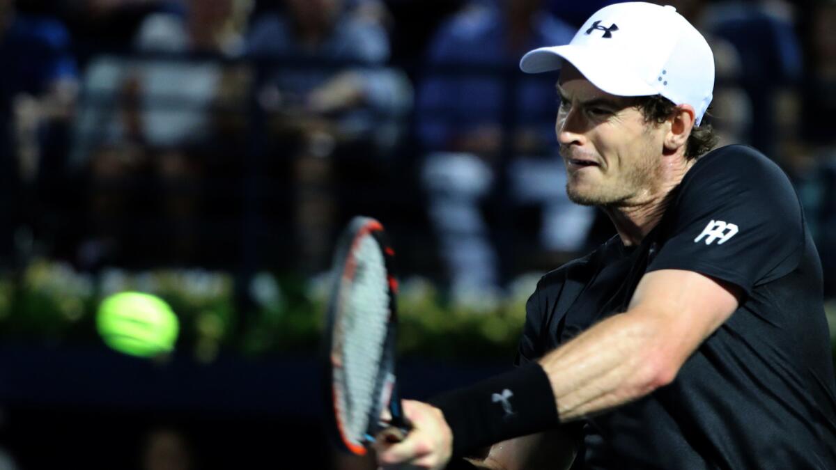 Andy Murray plays a backhanded return against Fernando Verdasco during their championship match in Dubai on Saturday.