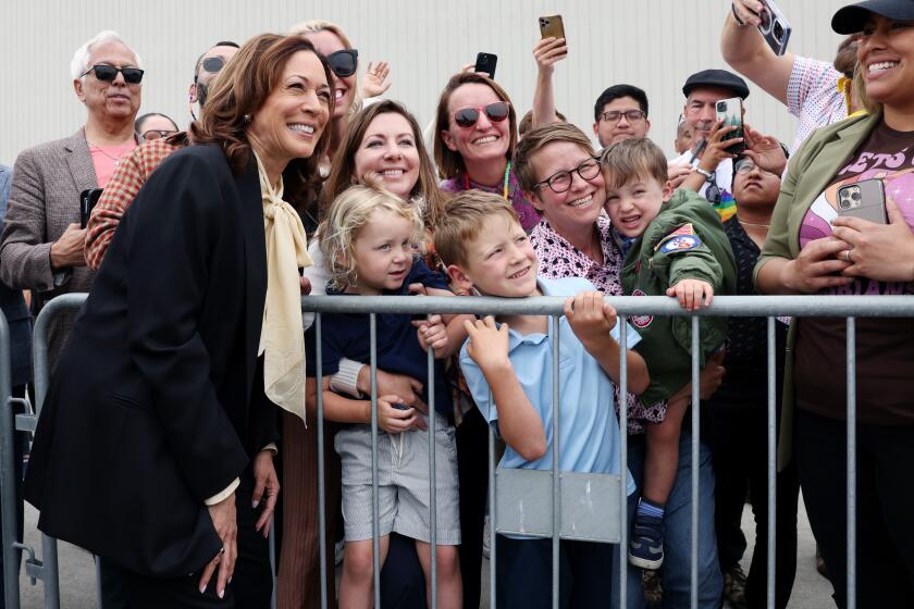 EL-SEGUNDO-CA-JUNE 1, 2024: Vice President Kamala Harris poses for photographs at Los Angeles International Airport before her departure to Seattle, Washington for a political event on June 1, 2024. (Christina House / Los Angeles Times)