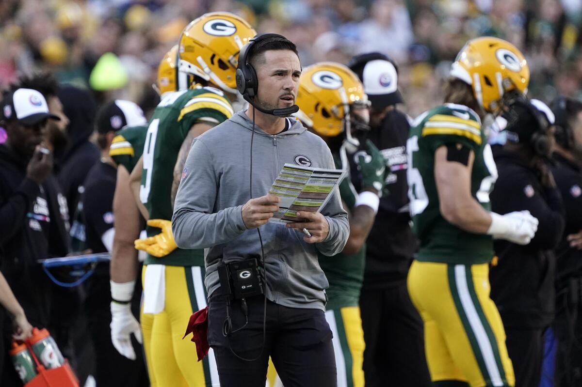 Green Bay Packers head coach Matt LaFleur watches from the sideline during the first half of an NFL football game against the New England Patriots, Sunday, Oct. 2, 2022, in Green Bay, Wis. (AP Photo/Morry Gash)