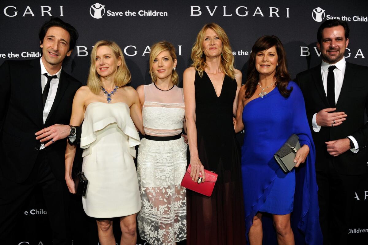 Actors Adrien Brody, left, Naomi Watts, Katheryn Winnick, Laura Dern and Marcia Gay Harden are shown with Stephane Gerschel, Bulgari's international communications director.