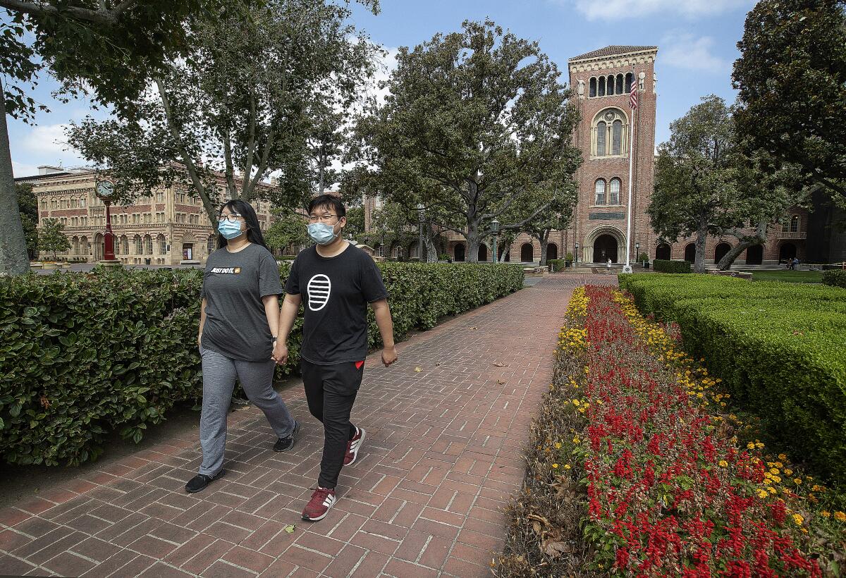 Students walking on the USC campus.