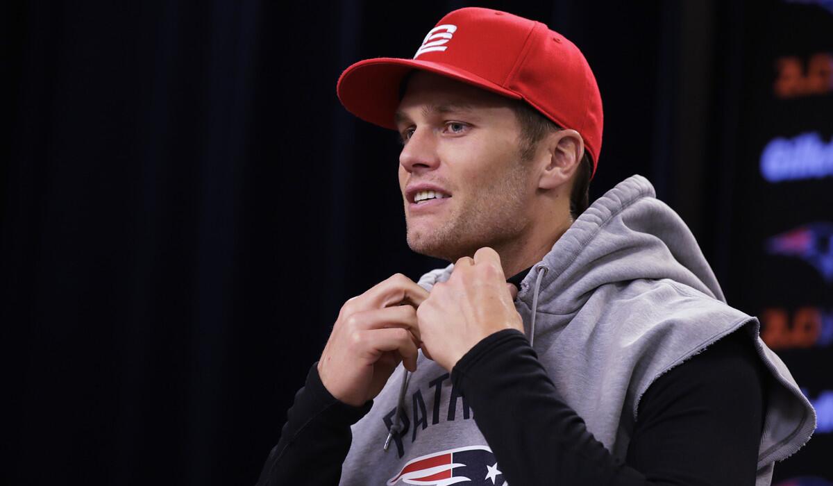 New England Patriots quarterback Tom Brady prior to a football practice on Wednesday.