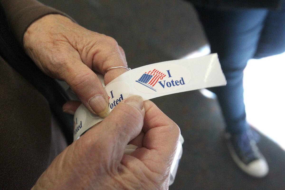 Voting stickers Tuesday at a polling station in Big Bear.