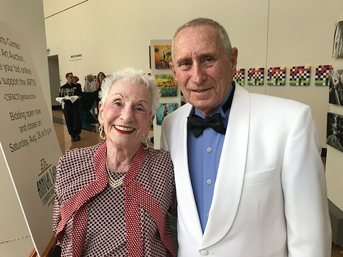 In this undated image provided by the Jewish National Fund-USA, Dr. Morton Mower and his wife, Toby, pose for a picture. Dr. Morton Mower, a former Maryland-based cardiologist who helped invent an automatic implantable defibrillator that has helped countless heart patients live longer and healthier, has died at age 89. Funeral services were held Wednesday, April 27, 2022, for Mower, who died two days earlier of cancer at Porter Adventist Hospital in Denver, The Baltimore Sun reported. The Maryland native had moved to Colorado about a decade earlier. (Courtesy of Jewish National Fund-USA via AP)