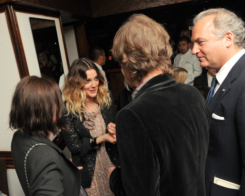 Drew Barrymore, Mick Jagger and Charles Finch