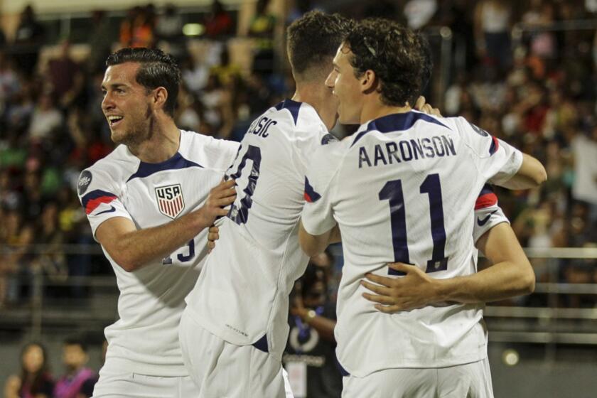 U.S. players celebrate their goal against Grenada during a CONCACAF Nations League soccer match.