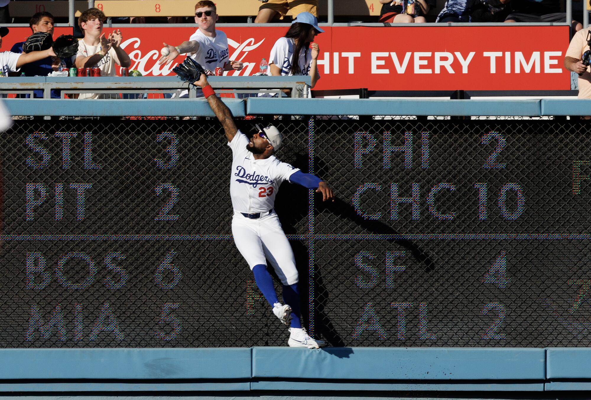 Dodgers right fielder Jason Heyward can't reach a home-run ball hit by Arizona's Joc Pederson in the first inning.